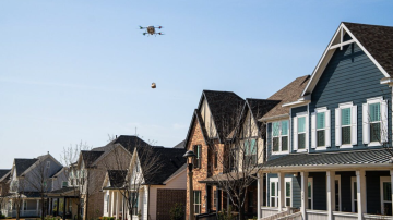 Manna Drone delivering a package to a consumer's home